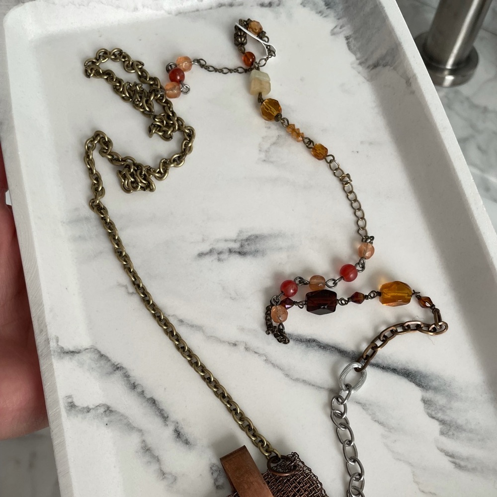 Long beaded necklace with pendant